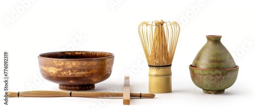 On white background, a bamboo tea whisk for matcha is shown making green tea.