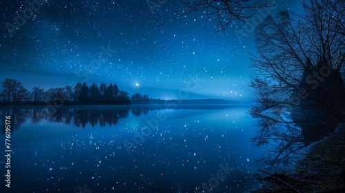A beautiful night sky with stars and a calm lake. The stars are scattered throughout the sky, creating a serene and peaceful atmosphere. The lake reflects the stars, adding to the sense of tranquility