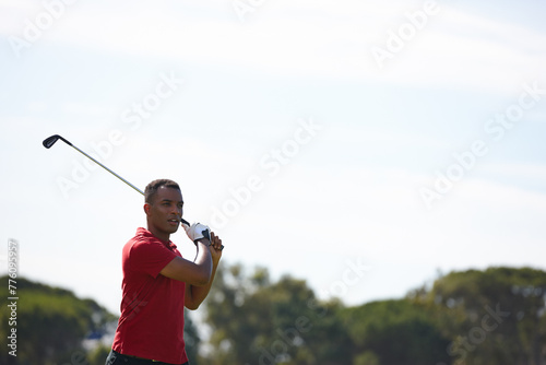 Man, golf course and swing with club for point, score or par in outdoor nature with blue sky. Male person, sports player or golfer hitting ball for competition, challenge or practice on mockup space