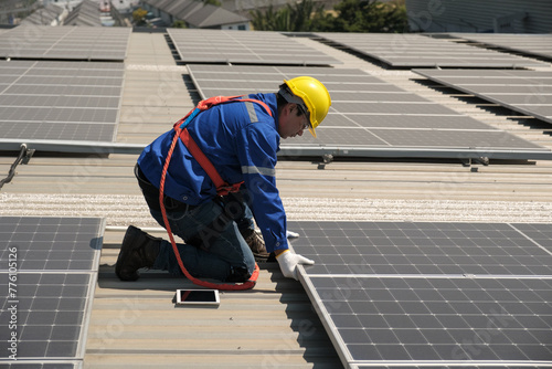 Wallpaper Mural Engineers or workers install and inspect solar cell on the roof of the factory. Torontodigital.ca