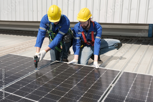 Wallpaper Mural Engineers or workers install and inspect solar cell on the roof of the factory. Torontodigital.ca