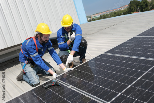 Wallpaper Mural Engineers or workers install and inspect solar cell on the roof of the factory. Torontodigital.ca