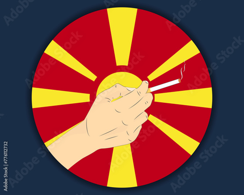 Holding a cigarette with Macedonia flag, smoking and addiction idea