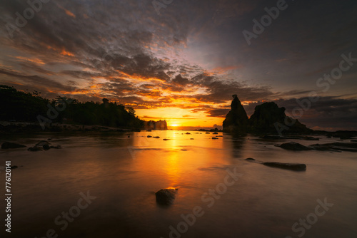 sunrise over the sea at Tanjung Layar Sawarna Bayah Banten Indonesia photo