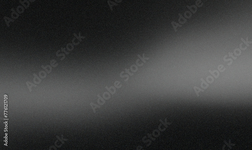 White grayish graphite gradient on a coal black grainy background