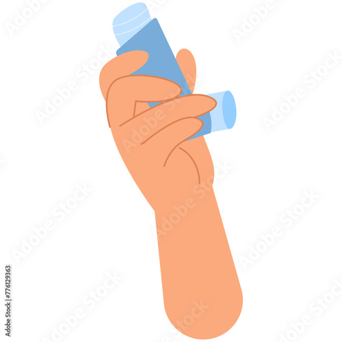 A hand holds an asthma inhaler. World Asthma day. Allergy, asthmatic. Inhalation medicine.