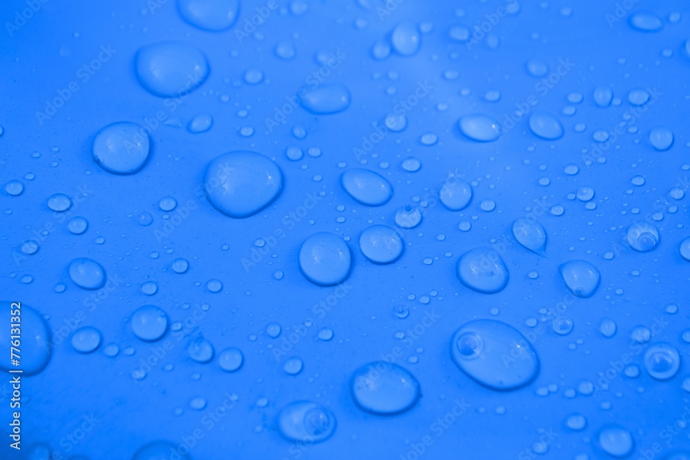 abstract water drops on blue surface