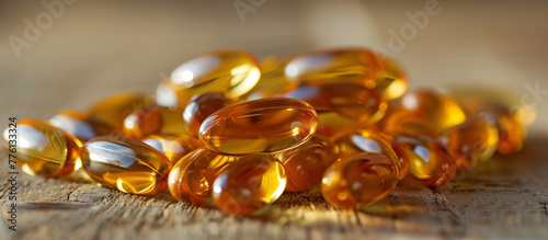  Fish oil omega-3 yellow capsules close up. Health care theme.