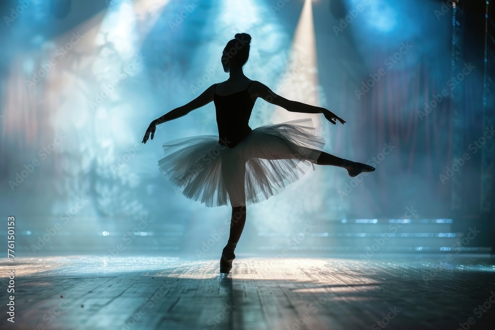 ballerina dancing on stage light
