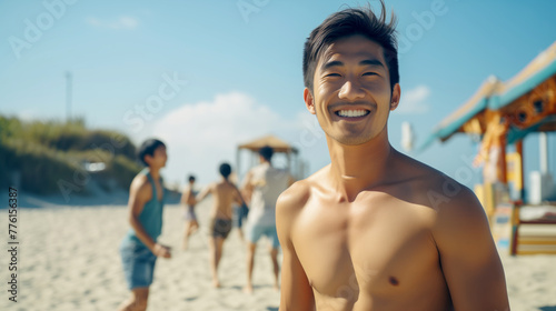 A smiling shirtless asian man at the tropical beach background with copy space area, beautiful summer beach and blue sky