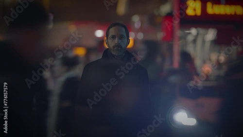 Male Person with Glasses Standing Out of the Crowd Thoughtfully Uncertain