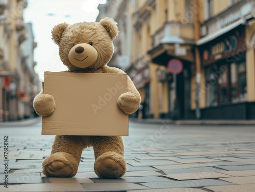 A cute teddy bear holding a blank billboard in both hands in the city center