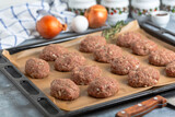 Cutlets made of raw minced meat are ready for cooking.