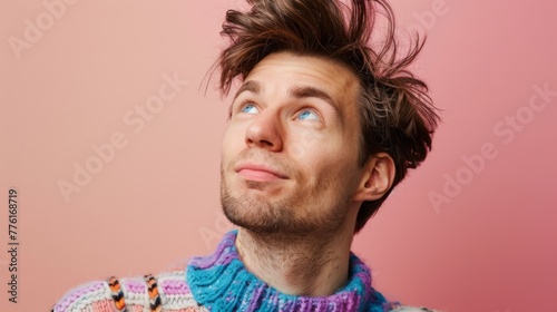 Man In Colorful Sweater Pondering photo