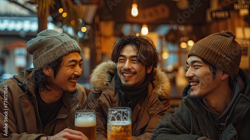 Three Asian men share good times drinking beers at the bar table.