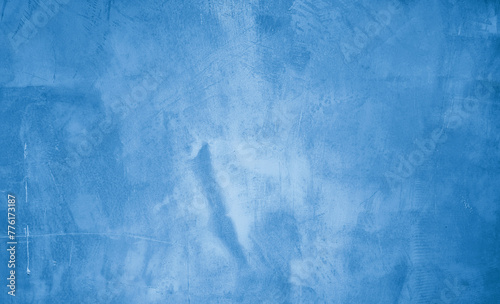 bright blue plaster concrete wall texture use as background. premium cyan wallpaper with copy-space. background and texture of bare concrete wall. premium urban wallpaper.