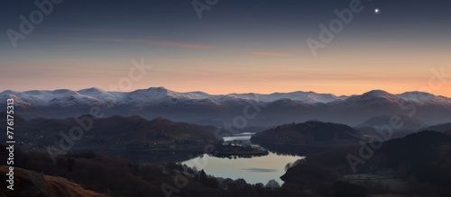 Mercury and a new moon over Loughrigg in the Lake District