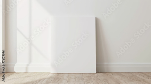 blank canvas, mockup on woorden floor against wall