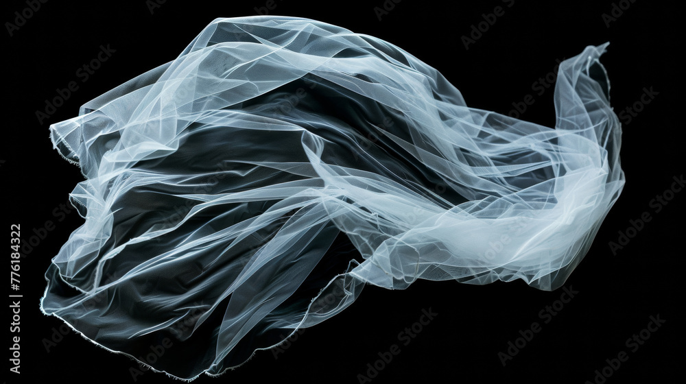 Fototapeta premium Flaying wedding white Bridal veil isolated on black background. 
