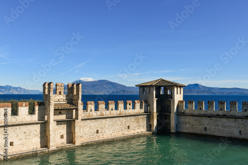 The dockyard of the Scaliger Castle, one of the better preserved castles of Italy and rare example of lake fortification, Sirmione, Brescia, Lombardy, Italy