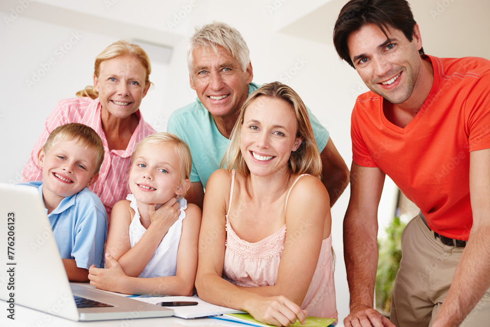 Obraz premium Happy, parents and grandparents in lounge on laptop with children for entertainment at home for development. Mom, dad and siblings bonding on vacation to visit grandma, grandpa and childhood house