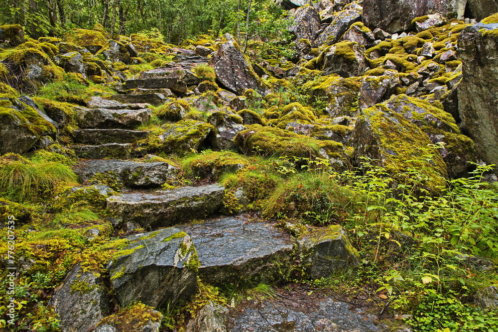 Hiking track at the waterfall Skjervsfossen at the scenic route Hardanger in Norway, Europe
