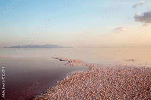 Sunset over the Lake Urmia. Dead  lake landscape. Lake Urmia sunset. Lake Urmia is an endorheic salt lake located between the provinces of East Azerbaijan and West Azerbaijan in Iran. photo