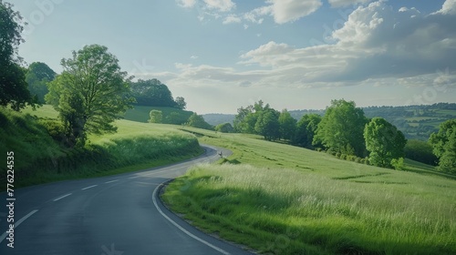 A scenic cycling route winding through picturesque countryside landscapes, with cyclists enjoying the fresh air and physical activity as they pedal along the path.