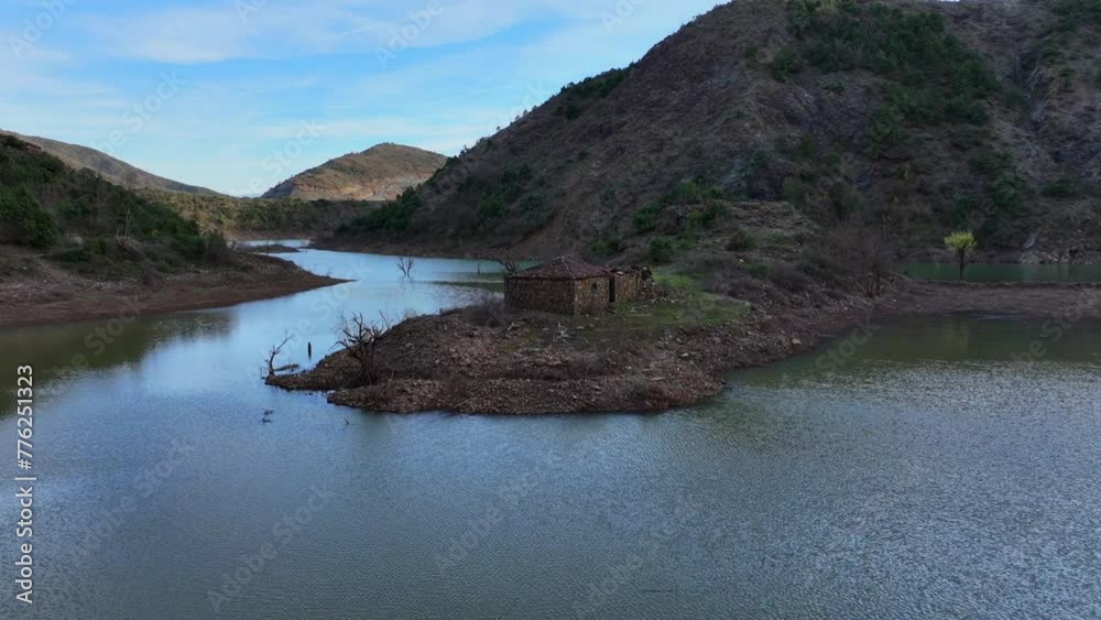 Aerial video of an abandoned shack that has been flooded several time by the rising waters of the lake. Aerial video of an abandoned shack that has been flooded several time by the rising waters of the lake.