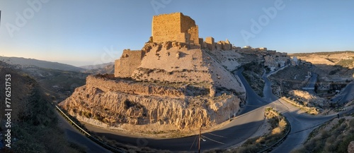 Medieval Crusaders Castle in Al Karak - Jordan, Al Kerak fortrest in arab world served as a fort for many centuries, historical ruins on a mountain above the city photo