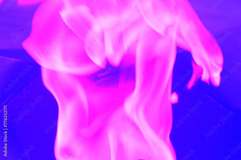 Bright abstract pink burning fire on a blue background. Abstract background with flame tongue texture. Bright abstract pink burning fire on a blue background. Abstract background with flame tongue texture.