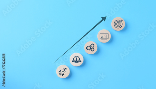 Strategic business growth and success path concept. Strategic growth path with icons representing teamwork, innovation, and target achievement on a blue background. planning strategy, investment goals