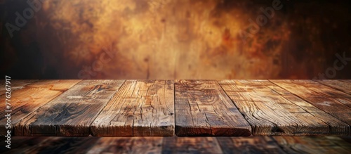 A wooden table with a dark background and a light shining through it