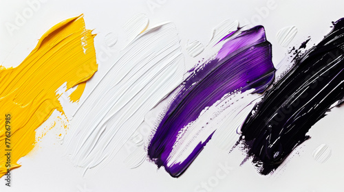 The four colors of paint are yellow, white, purple, and black. The brush strokes are messy and splattered, giving the impression of a chaotic and energetic scene. photo