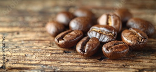 Close-Up View of Roasted Coffee Beans on Wooden Surface.