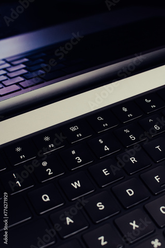 Closeup of a laptop's keyboard. Concept of writing, creating, writing a code, and IT.