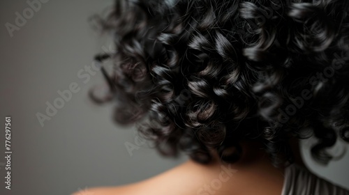 woman seen from behind with black, curly hair, generative ai