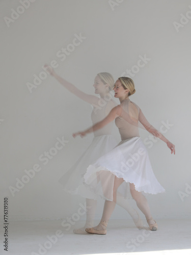 Beautiful Young Ballerina in motion. Double exposure image. Dance art, Freedom of Movement concept.