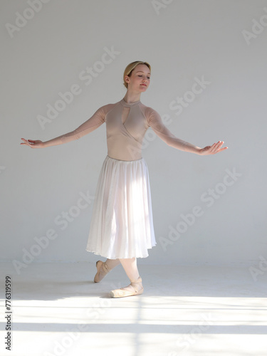 Beautiful ballerina dancing between light and shadows Psychology , emotions concept