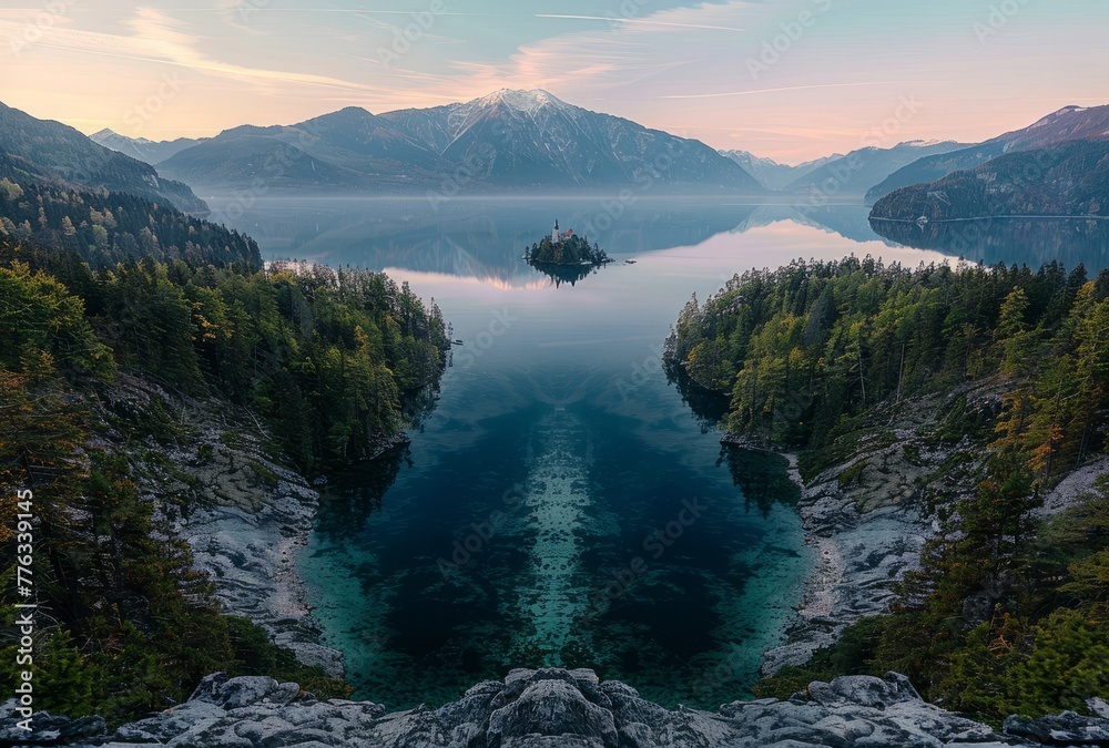 An island in the middle of a lake beneath the mountains