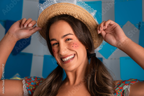 Festa Junina: party in Brazil, close up of woman smiling at June Festival in caipira style clothes.