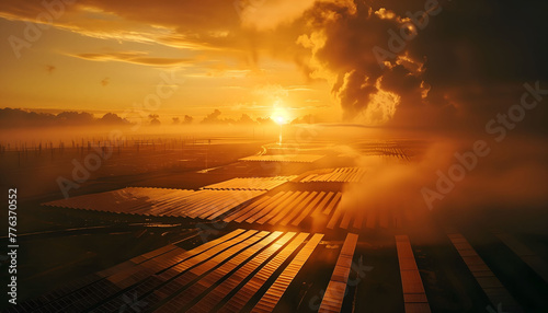 A large solar panel station at sunset in orange colors.