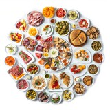 A circle of food including a variety of food on a white background