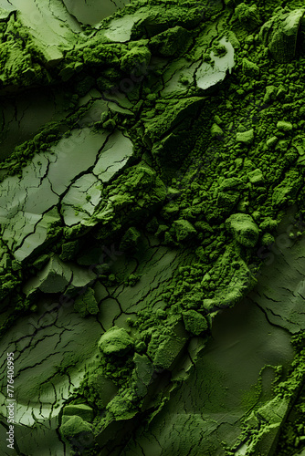 A close up of green powder with a rough texture. Concept of ruggedness and naturalness, as if the powder is a part of the landscape photo