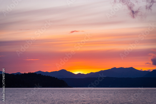 sunset in the mountains over water, Hood Canal, Pacific Northwest Washington State