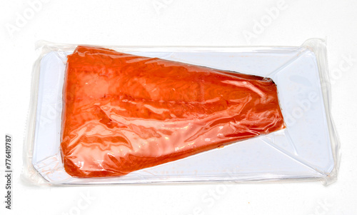 Raw cold smoked salmon packed in plastic bag sold in supermarket © Tatty