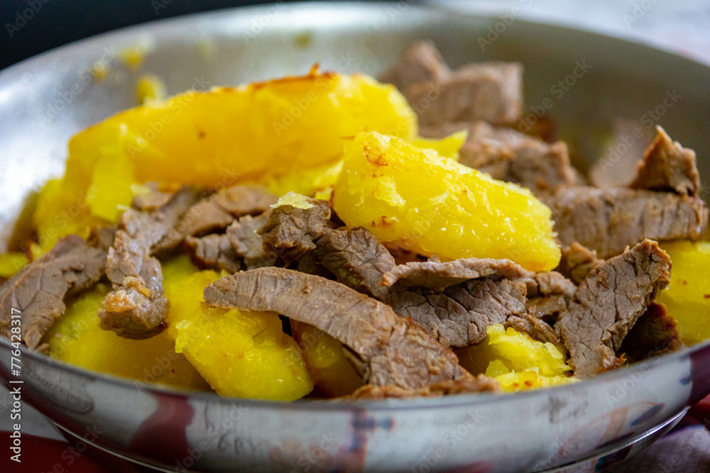 Traditional carne de sol with cassava, typical Brazilian dish - obrazy, fototapety, plakaty 