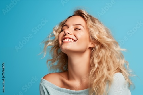 Portrait of Caucasian White Female on Blue Background