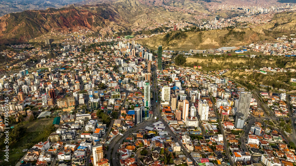 La Paz, Bolivia, aerial view flying over the dense, urban cityscape. San Miguel, southern distric