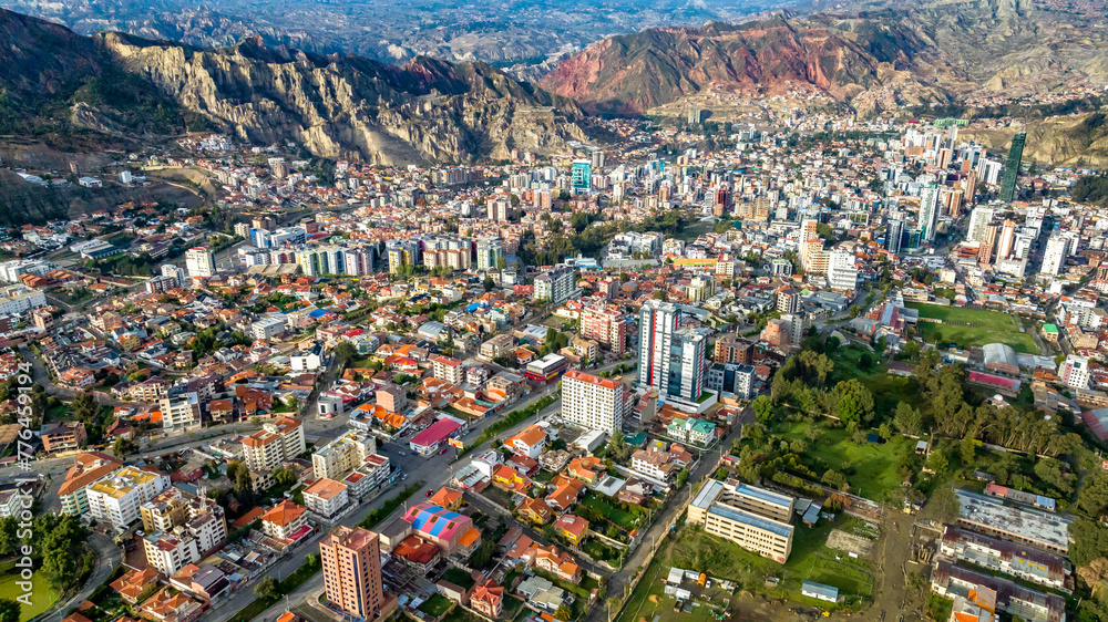 La Paz, Bolivia, aerial view flying over the dense, urban cityscape. San Miguel, southern distric
